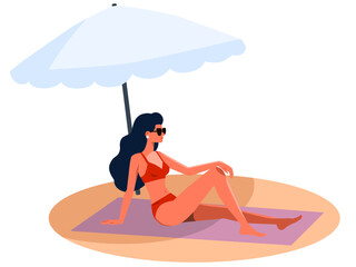 Girl sunbathing on the beach with an umbrella