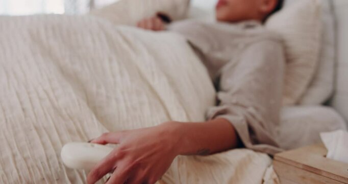 Woman, hands or electric blanket with switch in bed for warm, heat or comfort at home. Closeup, female person or setting with electronic sheet, duvet or temperature for cosy sleep in bedroom at house