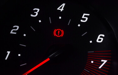 car speedometer and handbrake on symbol