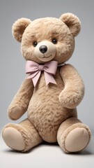 Fototapeta premium Cute teddy bear with bow on white background