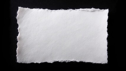 Obraz premium White torn square paper isolated on black background low angle view