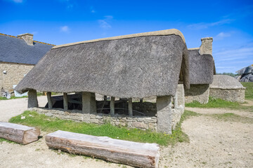 Meneham, Kerlouan, in Brittany, thatched cottage between the rocks
