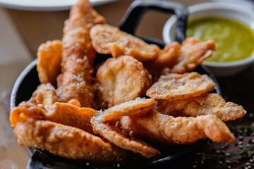 Fish and chips sprinkled with sea salt.