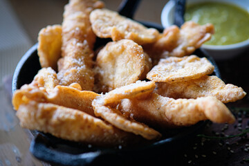 Fish and chips sprinkled with sea salt.