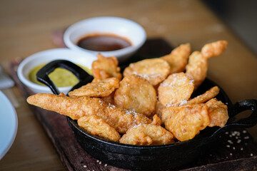 Fish and chips sprinkled with sea salt.