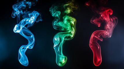 Fototapeta premium Three different-colored smoke shapes on a black background, in shades of green, blue, and red. 