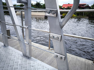 Close up of the cable anchoring point of bridge railing