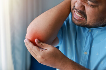 A man injured his elbow and it was swollen and red. Causes of pain include Lifting heavy objects,...