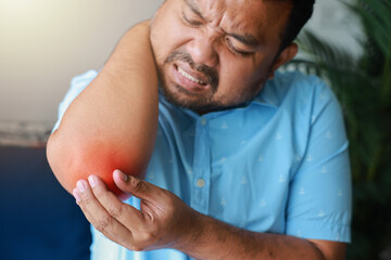 A man injured his elbow and it was swollen and red. Causes of pain include Lifting heavy objects,...