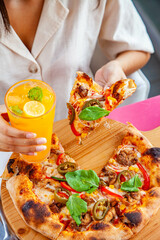 Lifestyle food with italian pizza naples hand tossed with fresh ingredients and cooler drinks.