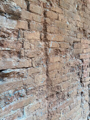 Aged Red Brick Wall with Rough Surface
