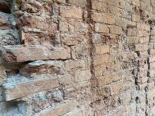 Aged Red Brick Wall with Rough Surface