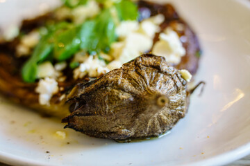 Grilled eggplant with curry, feta format and all black, Sant Cugat del Vallès, (Vallès Occidental), Catalonia, Spain