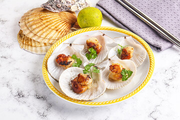 Grilled scallops shell with butter