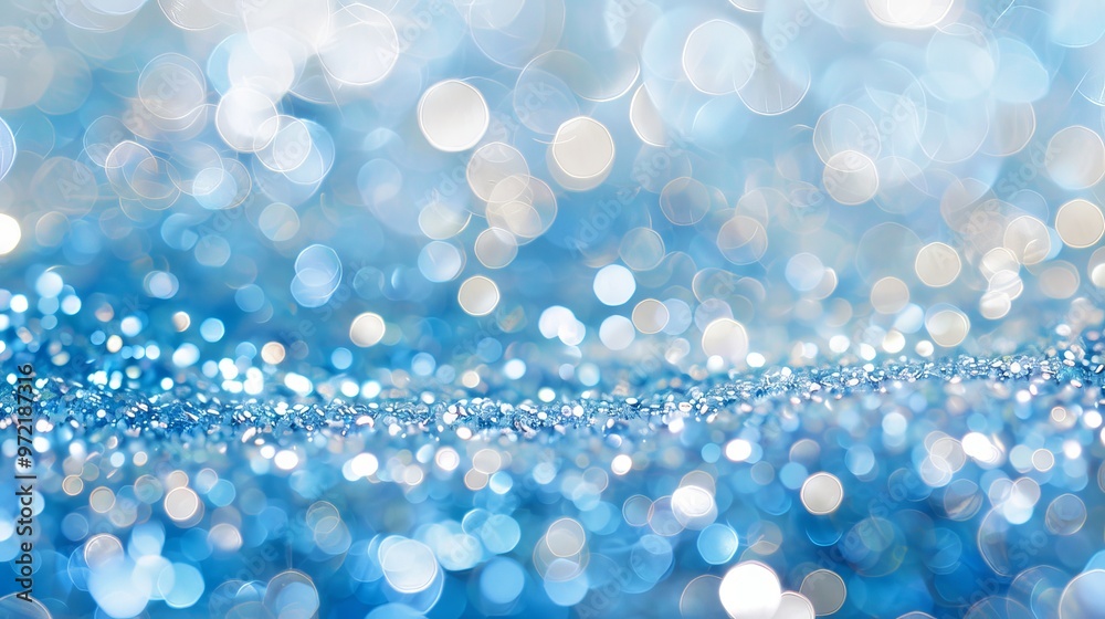 Wall mural abstract blue bokeh light background with soft blurred circles and bright sparkling effects