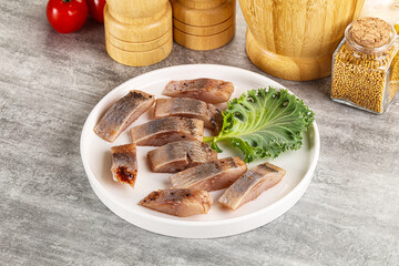 Sliced salted herring fillet snack