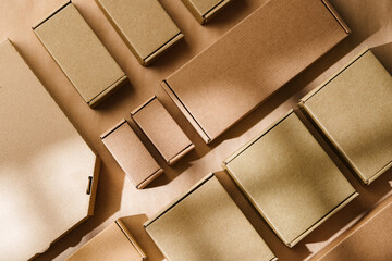 Multiple cardboard boxes arranged on a surface for packaging and shipping in a warehouse setting