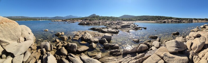panorama of rocks and stones at a beach at Sentier Littoral des Bruzzi, crosica, france