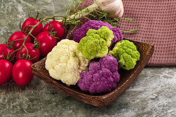 Raw cauliflower different colors heap