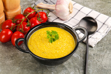 Vegetarian corn cream soup served parsley