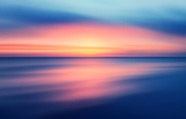 Fototapeta premium Motion blurred background of sunset on the sea