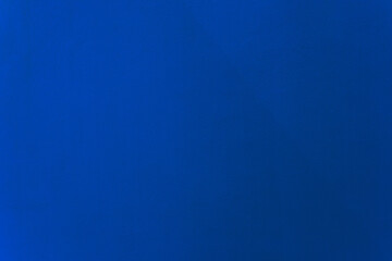 Blue color paint on cement wall texture as background.