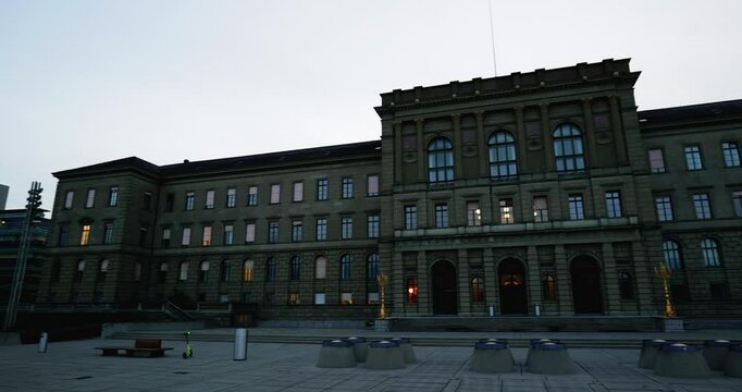 06-09-2024 Zurich, Switzerland. ETH Zentrum University main building panning shot. Early summer morning, wide angle, real time, no people