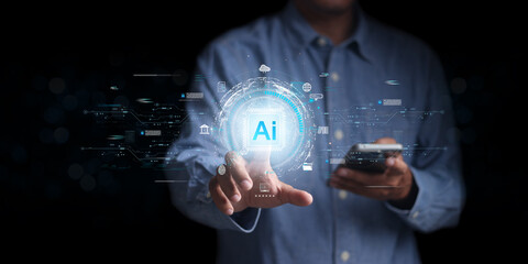 Chat with AI or Artificial Intelligence. Young businessman chatting with a smart AI or artificial intelligence using an artificial intelligence chatbot developed by OpenAI.