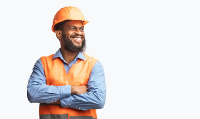 Happy African Builder Workman Standing Pleased Crossing Hands Posing On White Studio Background. Panorama, Copy Space