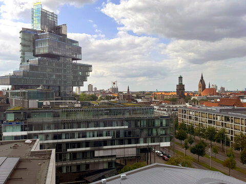 Panoramic view over the city center of Hanover, Northern Germany. The Aegidienkirche and the Marktkirche, the old town and the glass building of a bank.  