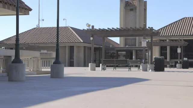 Walking up steps in downtown Glendora, California with gimbal video walking forward.