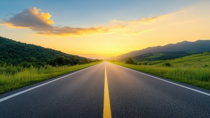 A tranquil sunset over a long road, surrounded by lush green hills and open fields, perfect for travel and nature themes.