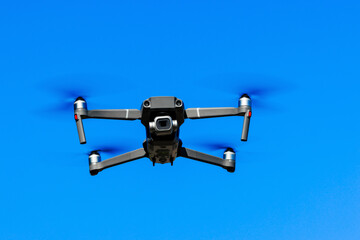 Drone fly in the blue sky. Drone Filming View. High quality photo.