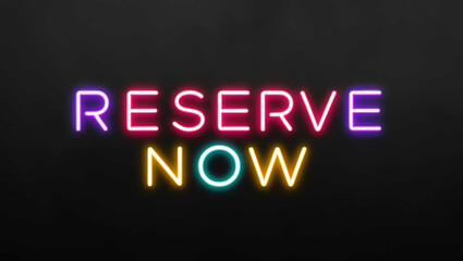 Reserve now colorful neon lettering on plain black dark background