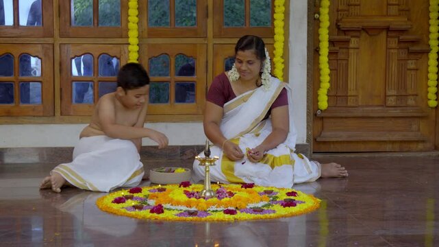 Athapookkalam decorating for onam festival in Kerala ,pookalam decorating Kerala traditional family for onam celebration