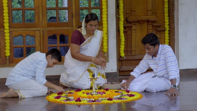 Athapookkalam decorating for onam festival in Kerala ,pookalam decorating Kerala traditional family for onam celebration
