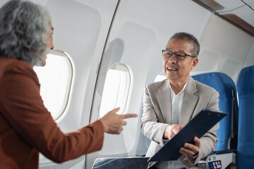 Presenting a business plan, a professional venture capitalist discusses a new startup project,...