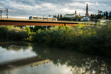 Fototapeta premium Metro Bridge over Guadalquivir River in Sevilla Scenic Landscape