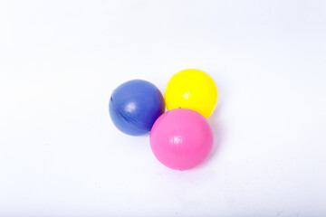 Collection of Plastic Ball blue, pink and yellow  toy isolated on a White background