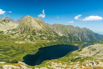Dolina Pieciu Stawów Polskich with lake and peaks above in High Tatras mountains in Poland - view from hiking trail to Szpiglasowy Wierch © honza28683