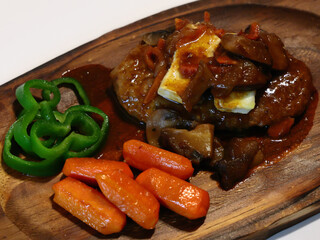 Hearty cheeseburger with mushroom demi-sauce