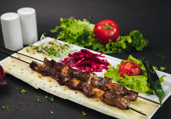 liver kebab with vegetables