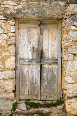 Old Greek wooden door in Tholaria village on Amorgos island, Greece