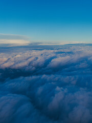 view on clouds from airplane window
