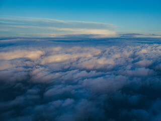 view from airplane window on cloudscape