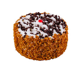 Delicious round cake with chocolate sprinkles and white cream standing on white background