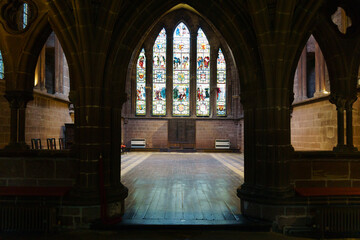 Chester, England, United Kingdom - June 25, 2018: Pillars and stained glass at Chester Cathedral