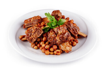 Tasty braised lamb shank with chickpeas on white plate