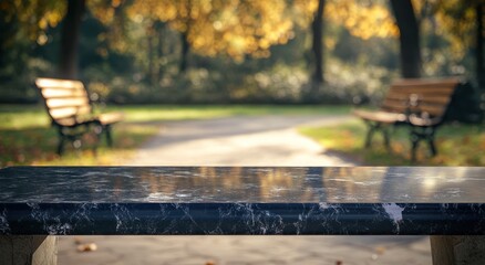 A park scene featuring a marble table with benches, surrounded by autumn foliage.