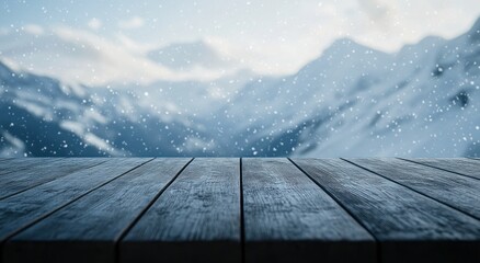 A snowy mountain landscape with a wooden table in the foreground.